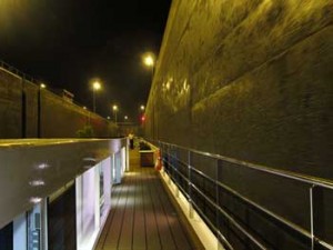 River Ship in a Lock on the Rhine at night. Problems with river cruising