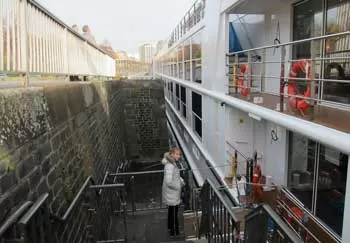 River Ship Moored next to wall in Cologne